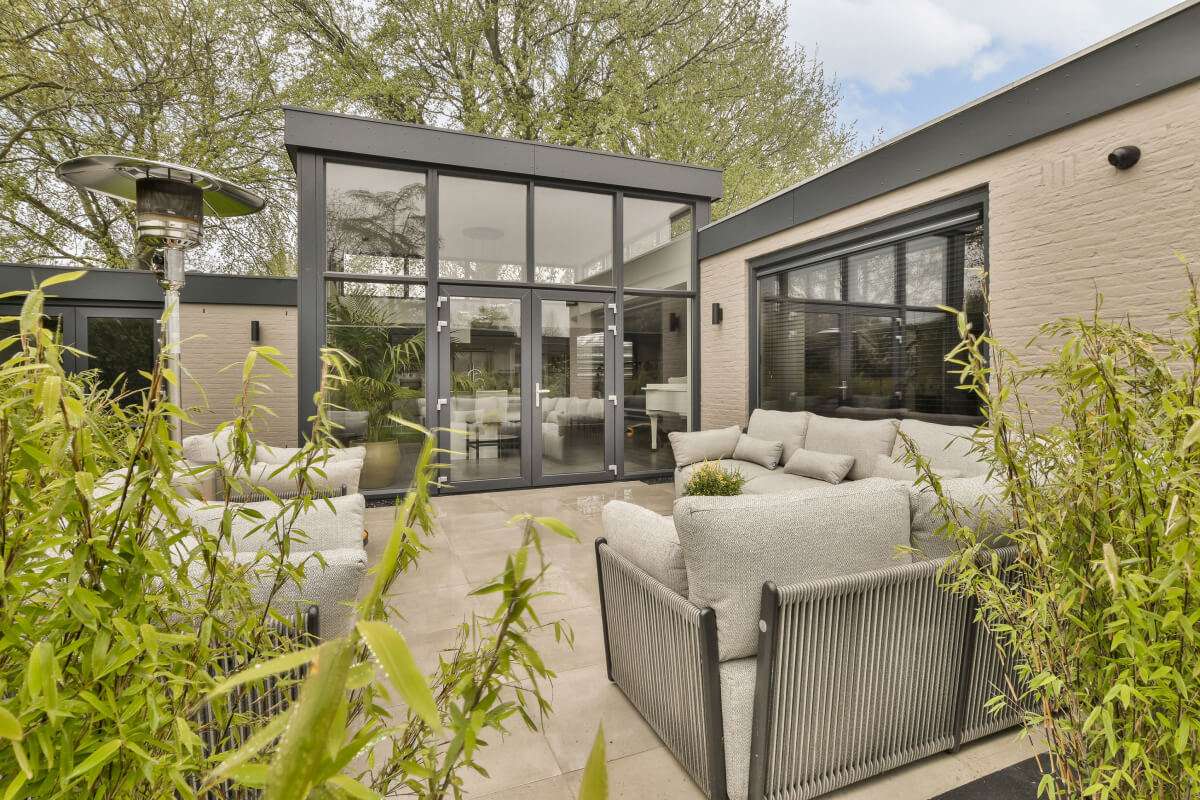 a living room with a couch and a chair on AUENRHF